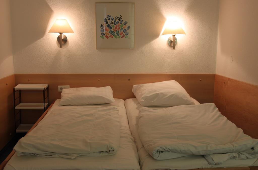 City Hotel Meesenburg Wurtzbourg Chambre photo